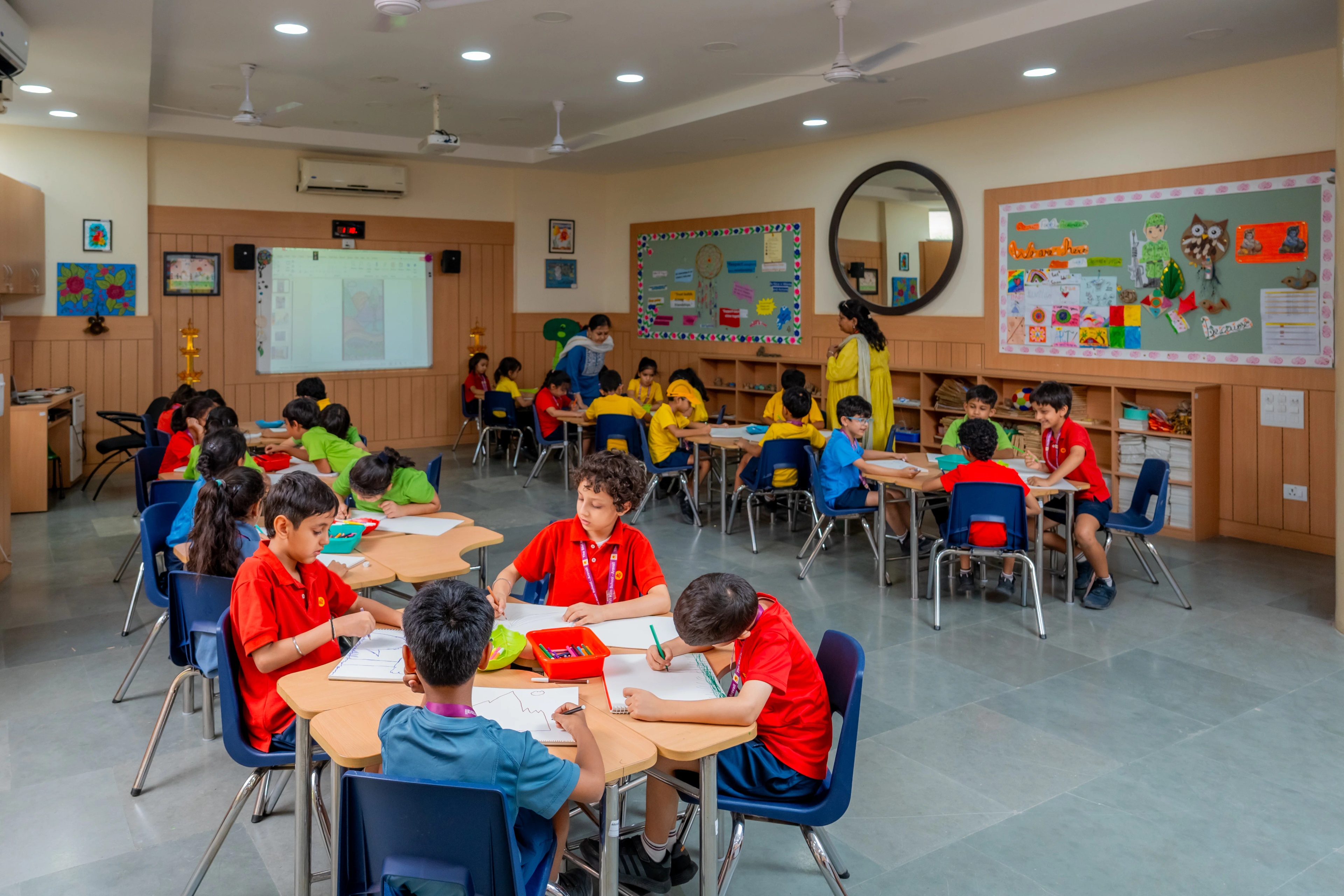 Junior School teacher facilitating collaborative learning