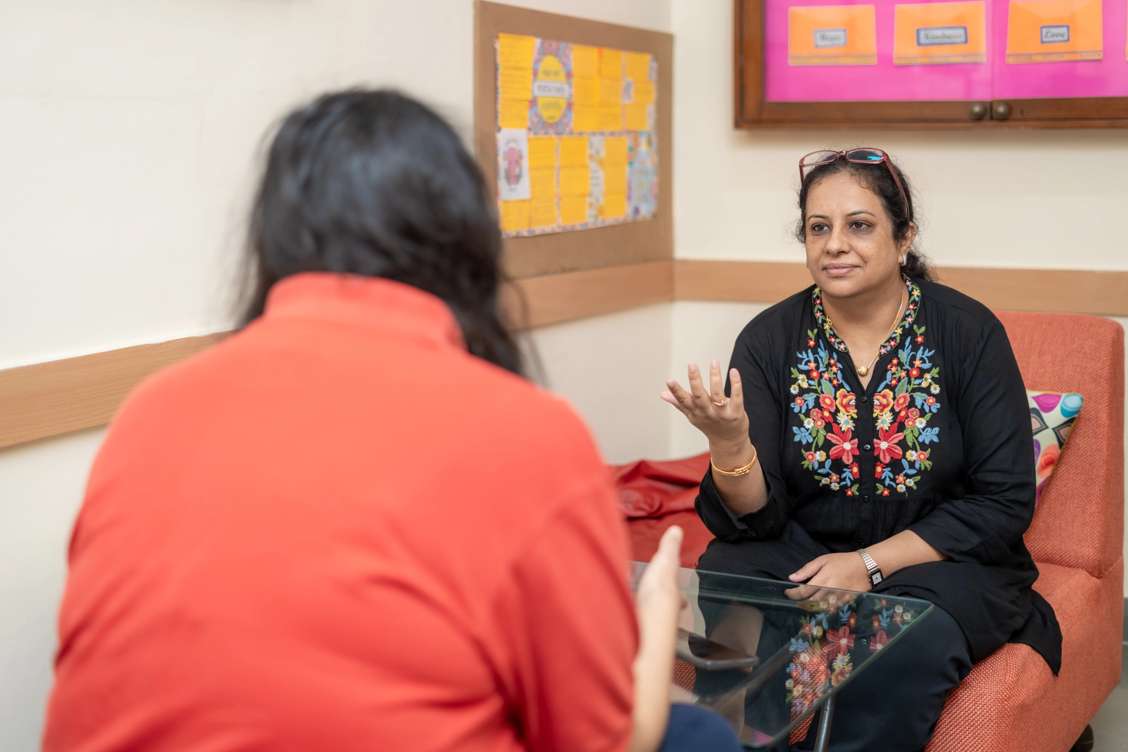 A student in a supportive conversation with a counsellor at The Shri Ram School